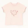 Blusa infantil rosa palo con corazón en relieve y volado rústico, estilo coquette