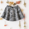 Falda batik de bengalina gris con broches níquel, corte campana cintura alta para niñas – Begoña Boutique